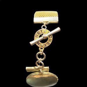 Vintage Monet stamped toggle clasp mesh bracelet with double locket